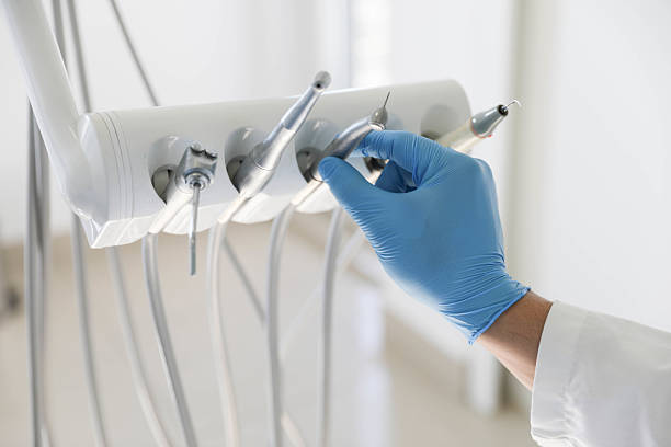 Professional Wisdom Tooth Removal technician working in Tilton Northfield, NH